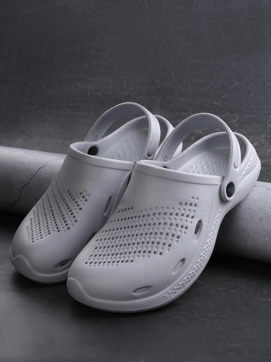 Clogs Footwear, lightweight, breathable slip-on shoes similar to Crocs.